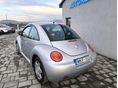 VOLKSWAGEN NEW BEETLE 1999/3 - 4