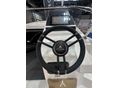 featuring the detailed steering wheel
