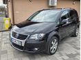 VOLKSWAGEN TOURAN Cross1.9 PD TDi DPF 7 SZEMÉLYES/BIXENON/TEMPOMAT/ÜLÉSFŰTÉS/RADAR/KIHANGOSÍTÓ/6 SEBESSÉG