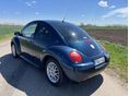 VOLKSWAGEN NEW BEETLE 2001/1 - 4