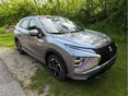 MITSUBISHI ECLIPSE CROSS 2.4 PHEV Instyle Navi 4WD CVT bőr panoráma tető HUD 360 fokos kamera zöld rendszám