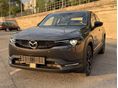 MAZDA MX-30 R-EV e-Skyactiv Exclusive-Line 420km hatótáv.Facelift.2028 ig teljeskörű garancia.Tökéletes állapot.Uj téli/nyá