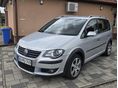 VOLKSWAGEN TOURAN Cross2.0 PD TDI DSG DPF 1 TULAJ/BIXENON/ÖNPARKOLÁS/ÜLÉSFŰTÉS/RADAR/TEMPOMAT/VONÓHOROG