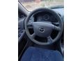 MAZDA 323 1999/10 - 8