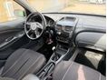 NISSAN ALMERA 2004/6 - 9