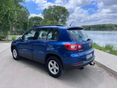 VOLKSWAGEN TIGUAN 2009/1 - 4