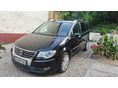 VOLKSWAGEN TOURAN 1.9 PD TDi Highline DSG DPF Rozsdamentes