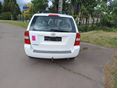KIA CARNIVAL 2011/3 - 4