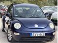 VOLKSWAGEN NEW BEETLE 2002/1 - 4