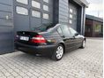 BMW 318 2005/3 - 4