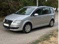 VOLKSWAGEN TOURAN 1.6 Trendline Family 7 Személyes Friss műszaki! Friss szerviz! Azonnal elvihető!