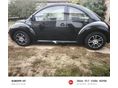 VOLKSWAGEN NEW BEETLE 1999/5 - 4